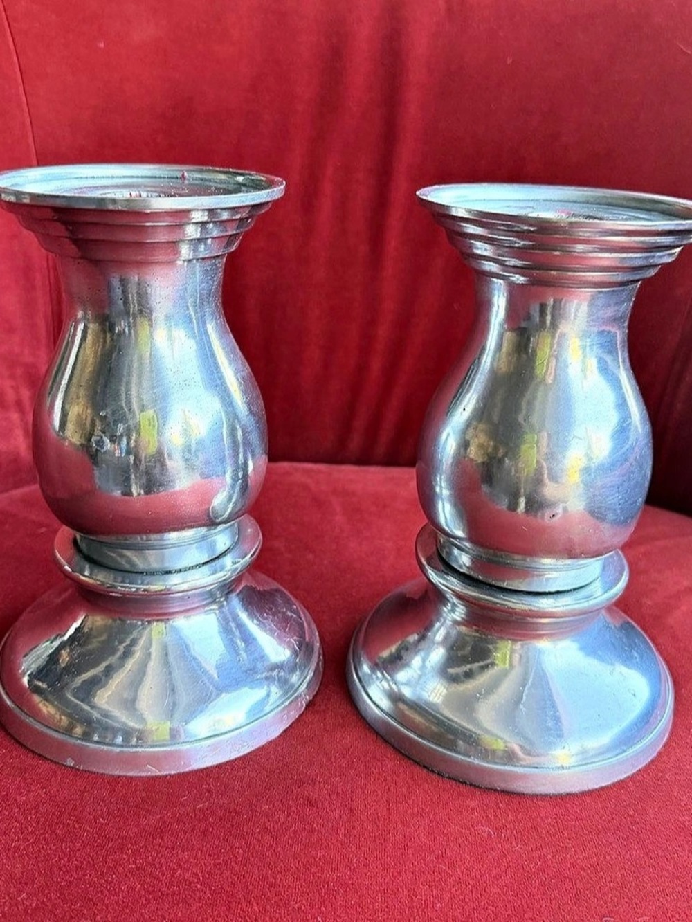 Pair of Polished Cast Aluminum Candlesticks